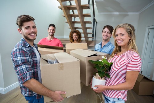 Removal team handling home furniture move in Edgware