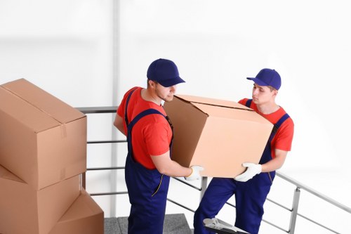 Team of Movers Edgware preparing household items for a careful relocation