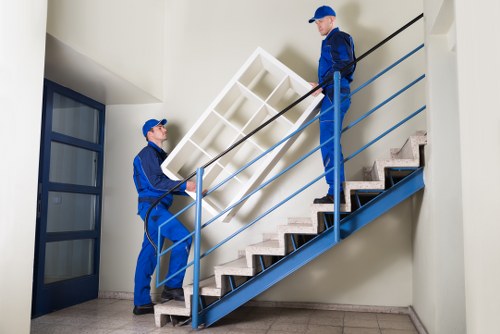 House removals team planning a move in Edgware with boxes and furniture