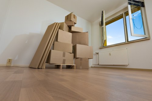 Packed boxes and furniture ready for a student move