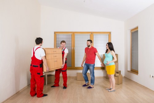 Office relocation crew organising loading and access for a commercial move in Edgware