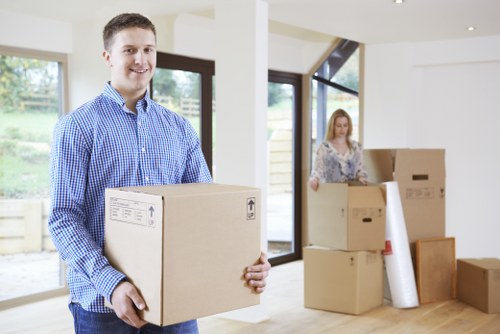 Packed boxes and furniture ready for urgent removal service