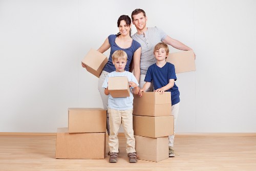 Packed boxes and household items ready for removal van transport