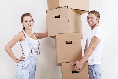 Edgware business relocation team preparing desks and packed office items for transport